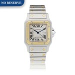 CARTIER  | REFERENCE 2319 SANTOS A STAINLESS STEEL AND YELLOW GOLD SQUARE SHAPED WRISTWATCH WITH DATE AND BRACELET, CIRCA 2000