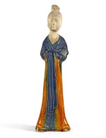A BLUE AND AMBER-GLAZED POTTERY FIGURE OF A COURT LADY TANG DYNASTY | 唐 三彩仕女陶俑
