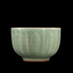 A Longquan celadon 'lotus' bowl Southern Song dynasty | 南宋 龍泉青釉蓮瓣紋墩式盌