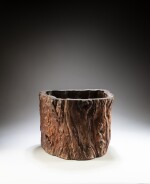A 'tree trunk' brushpot, Qing dynasty | 清 樹樁式筆筒