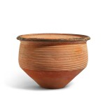 A large deep pottery bowl with horizontal grooves, Dawenkou to Longshan culture, 3rd millennium B.C. 大汶口至龍山文化 弦紋陶盌