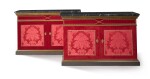 A pair of custom-made red silk and velvet covered side cabinets, by Alidad