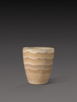 An Egyptian Banded Alabaster Cup, Old Kingdom, probably 1st Dynasty, 2965-2815 B.C.