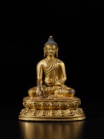 A gilt-copper alloy figure of Shakyamuni Buddha, Tibet, 15th century