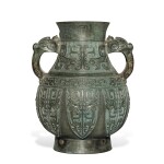 A large archaistic bronze 'taotie' vase (Hu), Late Qing dynasty | 清末 銅仿古饕餮紋壺 