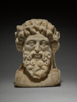 A Roman Marble Herm Head of Silenos, circa 1st Century A.D.