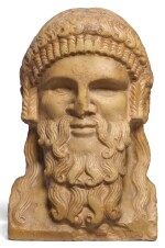 ROMAN GIALLO ANTICO MARBLE HERM BUST OF DIONYSOS OR HERMES, CIRCA 2ND CENTURY A.D.