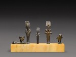 A Group of Five Small Egyptian Bronze Figures, Late Period, 716-30 B.C.