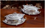 A PAIR OF EARLY GEORGE III SILVER SAUCE TUREENS, COVERS, AND STANDS, THOMAS HEMING, LONDON, 1769