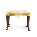 A George III style serpentine mahogany stool, after a design by Thomas Chippendale