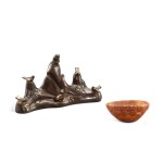 A parcel-gilt bronze 'monkey' brushrest and a small bamboo root cup, 17th century  十七世紀 局部鎏金銅五峰筆擱 及 竹根雕盃一組兩件