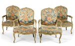 A SET OF FOUR LOUIS XV CARVED AND GREEN PAINTED FAUTEUILS À LA REINE, BY JEAN-BAPTISTE LELARGE CIRCA 1760