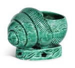 A GREEN-GLAZED BISCUIT MODEL OF A CONICAL SHELL | QING DYNASTY, KANGXI PERIOD
