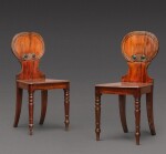A pair of George IV mahogany hall chairs, circa 1825