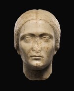 A ROMAN MARBLE PORTRAIT HEAD OF A WOMAN, ANTONINE, 3RD QUARTER OF THE 2ND CENTURY A.D.