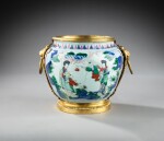 A Louis XV  gilt-bronze mounted Chinese porcelain flower pot, the porcelain Kangxi period (1662-1722), the mounts circa 1750 | Cache-pot en porcelaine de Chine d’époque Kangxi (1662-1722), monture de bronze doré d’époque Louis XV, vers 1750