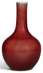 A COPPER-RED GLAZED BOTTLE VASE QING DYNASTY, 18TH CENTURY | 清十八世紀 紅釉長頸瓶