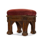 A George IV carved and pollarded oak stool by Morel and Seddon, circa 1827-28, the design attributed to A. W. N. Pugin