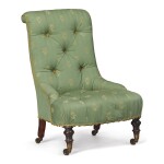  A GREEN UPHOLSTERED LOW CHAIR