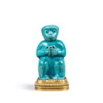 A gilt-bronze mounted blue enameled porcelain monkey-shaped tea pot, China, 18th century and Louis XVI style, 19th century | Théière en forme de singe en porcelaine émaillée bleu turquoise, Chine, XVIIIe siècle et montures de bronze doré de style Louis XVI, XIXe siècle