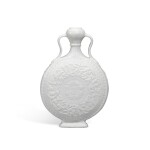 A rare white-glazed soft-paste 'Shou' moonflask, Qing dynasty, Qianlong period | 清乾隆 白釉漿胎壽字抱月瓶