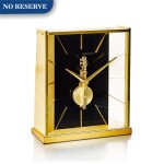 JAEGER-LECOULTRE  |  A GILT BRASS TABLE CLOCK WITH 8 DAYS POWER RESERVE, CIRCA 1970