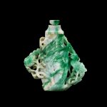A jadeite 'phoenix' vase and cover, Late Qing dynasty – early Republican period  | 晚清至民國初 翠玉浮雕鳳鳥寶珠蓋瓶