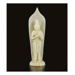 A WHITE JADE FIGURE OF GUANYIN, QING DYNASTY, LATE 19TH / EARLY 20TH CENTURY 