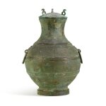 An archaic copper-inlaid bronze wine vessel, hu, Eastern Zhou dynasty, Warring States period | 東周戰國時期 青銅嵌紅銅蟠螭紋壺