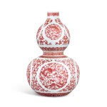 A very fine and rare copper-red decorated 'chilong' double-gourd vase Seal mark and period of Qianlong | 清乾隆 釉裏紅螭龍靈芝葫蘆瓶 《大清乾隆年製》款