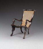 A Ceylonese ebony armchair, Galle District, mid-19th century | Fauteuil en ébène, Ceylan district de Galle, milieu du XIXe siècle