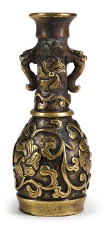 A SMALL 'HU WEN MING'-STYLE GILT-BRONZE VASE | 17TH CENTURY | 十七世紀 局部鎏金銅瑞獸耳卷草花紋瓶