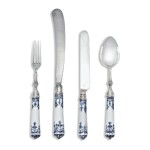A CASED ASSEMBLED SET OF ST. CLOUD AND FRENCH BLUE AND WHITE PORCELAIN SILVER AND STEEL-MOUNTED CUTLERY, CIRCA 1740