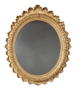 A CONTINENTAL OVAL GILTWOOD MIRROR