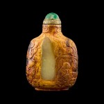 A greenish-yellow and russet jade snuff bottle Master of the Rocks, Qing dynasty, 18th - 19th century | 清十八至十九世紀 青黃玉帶皮巧雕劉海戲金蟾鼻煙壺