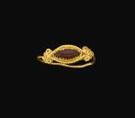 A HELLENISTIC GOLD AND GARNET RING, CIRCA 3RD/2ND CENTURY B.C.