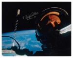[Gemini XII] — First Selfie in Space. Color photograph, signed and inscribed by Buzz Aldrin