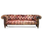 A late Victorian leather upholstered walnut Chesterfield sofa, late 19th century