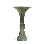 An inscribed archaic bronze ritual wine vessel, gu, Shang dynasty | 商 興觚