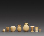 Eight Egyptian Alabaster Miniature Vessels, 3rd/2nd Millennium B.C.