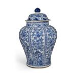 A blue and white 'floral' baluster jar and cover, Qing dynasty, Kangxi period | 清康熙 青花開光花卉紋蓋罐
