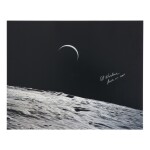 [APOLLO 15]. CRESCENT EARTHRISE VIEWED FROM LUNAR ORBIT. COLOR PHOTOGRAPH, SIGNED BY AL WORDEN