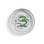 A green-enameled 'dragon' dish, Seal mark and period of Daoguang | 清道光 白地暗刻海水綠彩趕珠龍紋盤 《大清道光年製》款