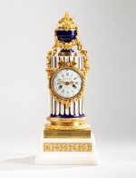 A Louis XVI gilt-bronze mounted Sèvres porcelain clock | Pendule colonne en porcelaine de Sèvres et montures de bronze doré d’époque Louis XVI