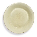 A CRACKLED WHITE-GLAZED DING-TYPE DISH