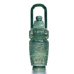 A small green jadeite hanging vase and cover, Early 20th century | 二十世紀初 翠玉雕仿古饕餮紋小提梁蓋壺