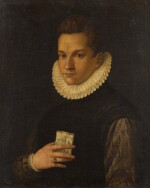 Portrait of a young man holding a letter