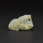 A white and russet jade qilin, Ming dynasty | 明 白玉麒麟把件