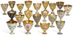 AN IMPORTANT COLLECTION OF TWENTY ENAMELLED GOLD AND GILT ZARFS, MADE FOR THE OTTOMAN MARKET, SWITZERLAND, 19TH CENTURY 