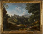 An extensive Italianate wooded landscape with figures on a path, a castellated villa beyond